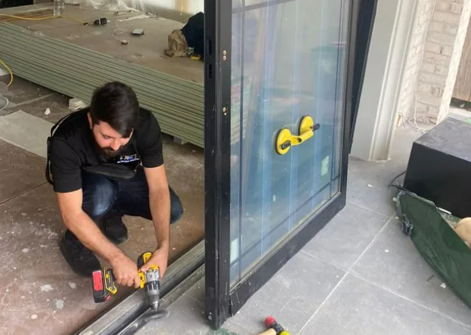 When to call a professional for automatic door repairs