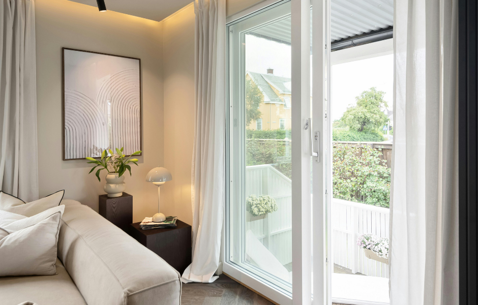 Modern sliding glass door in a bright living room — replacement cost guide by JDM Sliding Doors