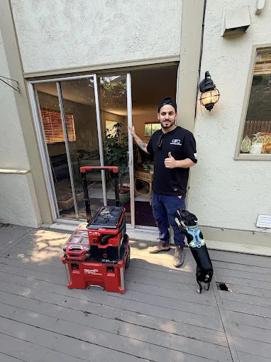 JDM technician after a residential sliding glass door repair at a Denver, Colorado home
