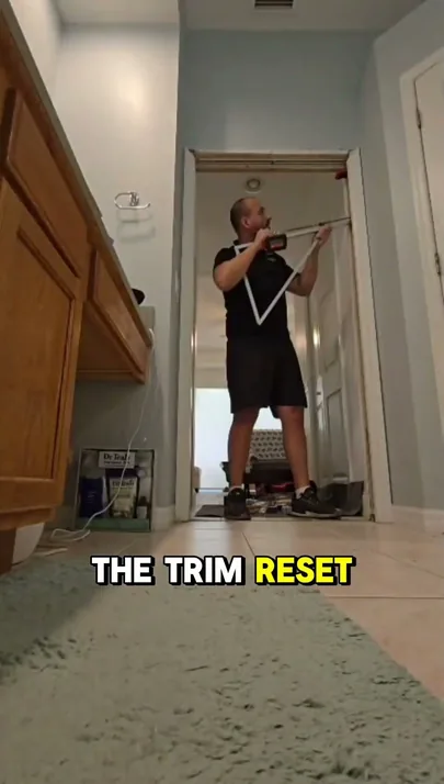 JDM technician resetting a pocket door